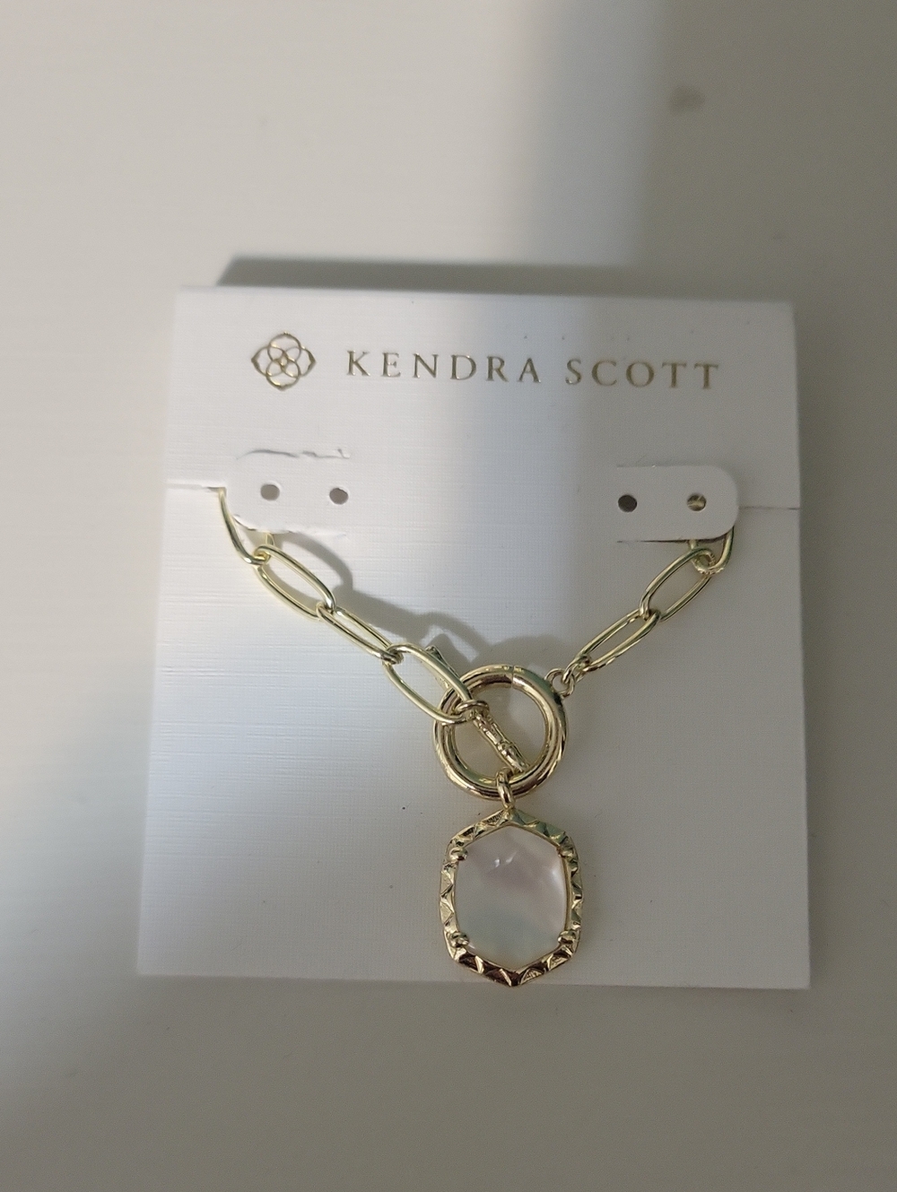 Kendra Scott Gold Chain Bracelet with White Pendant